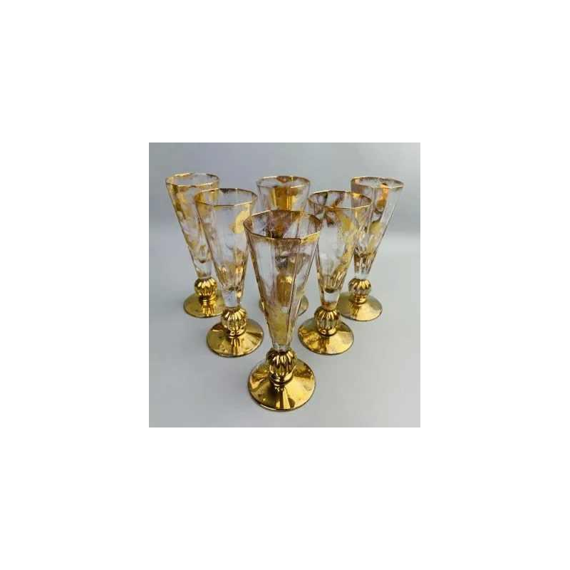 Jean-Paul van Lith in Biot, suite of six gilded crystal champagne flutes, 20th c