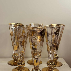 Jean-Paul van Lith à Biot, suite de six flûtes à champagne en cristal doré, XXe s