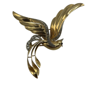 Liberation brooch, 18 K yellow gold, rose-cut diamonds, ruby cabochon, ca 1945