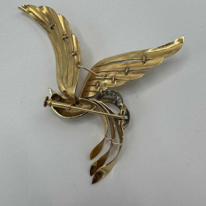 Liberation brooch, 18 K yellow gold, rose-cut diamonds, ruby cabochon, ca 1945