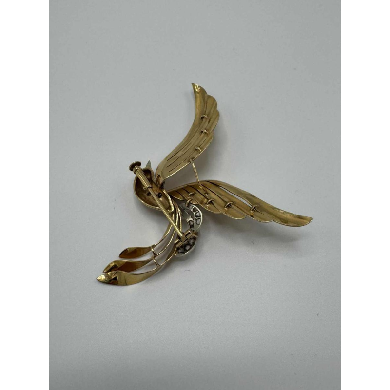 Liberation brooch, 18 K yellow gold, rose-cut diamonds, ruby cabochon, ca 1945