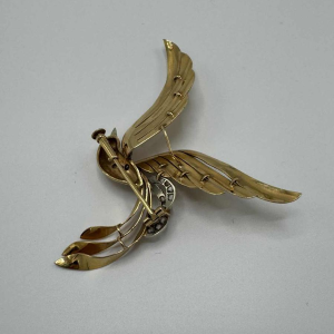 Liberation brooch, 18 K yellow gold, rose-cut diamonds, ruby cabochon, ca 1945