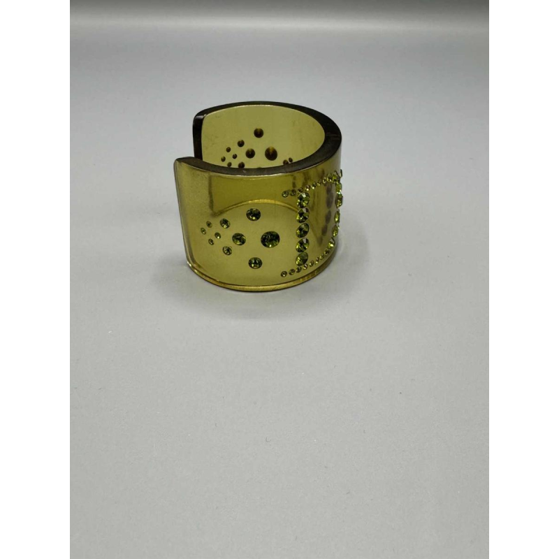 Christian Dior, manchet armband van groen doorschijnend bakeliet en Swarovski-steentjes