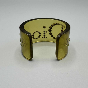 Christian Dior, bracelet manchette en bakelite translucide verte et strass Swarovski