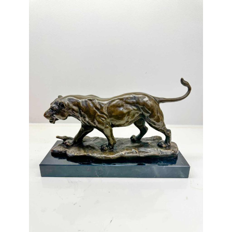 Sculpture of a lioness in bronze signed Barye (post-mortem casting)