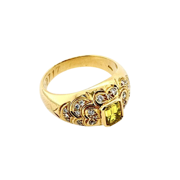 Yellow gold diamond & emerald cut ring