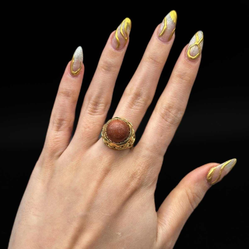 Bague à Système Rotatif Sertie d'Une Rhodochrosite