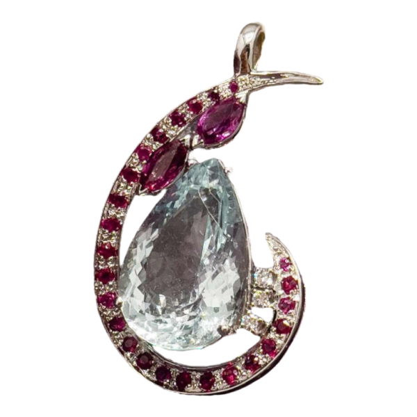 White gold pendant set with an aquamarine, ruby ??and diamond