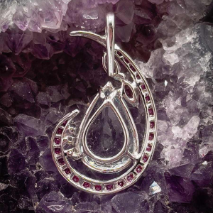 White gold pendant set with an aquamarine, ruby ??and diamond