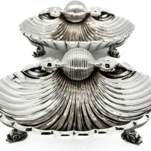 Pair of large 1 title silver shells. 916/1000
