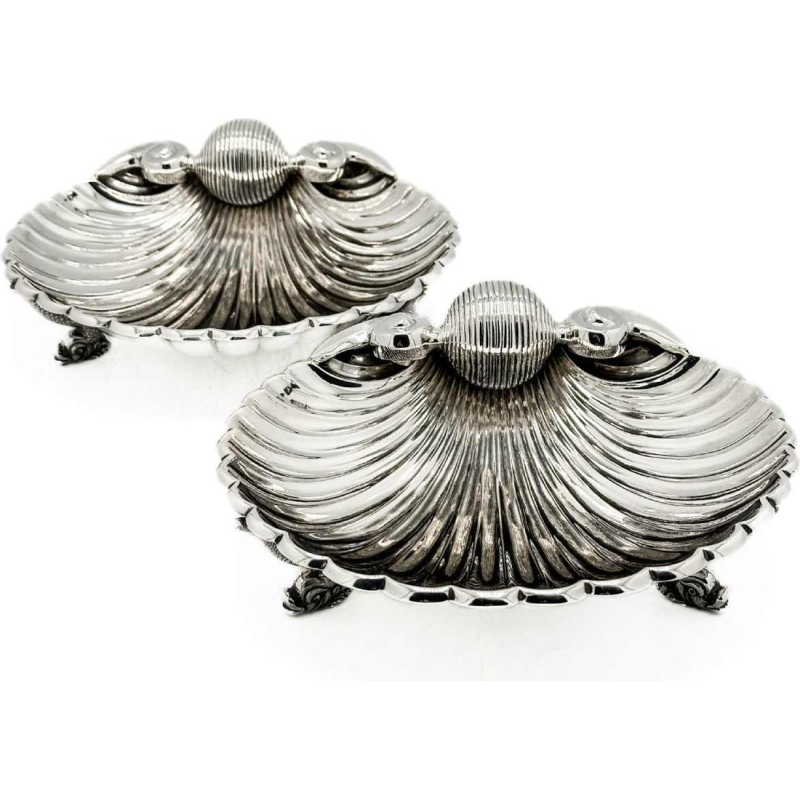 Pair of large 1 title silver shells. 916/1000