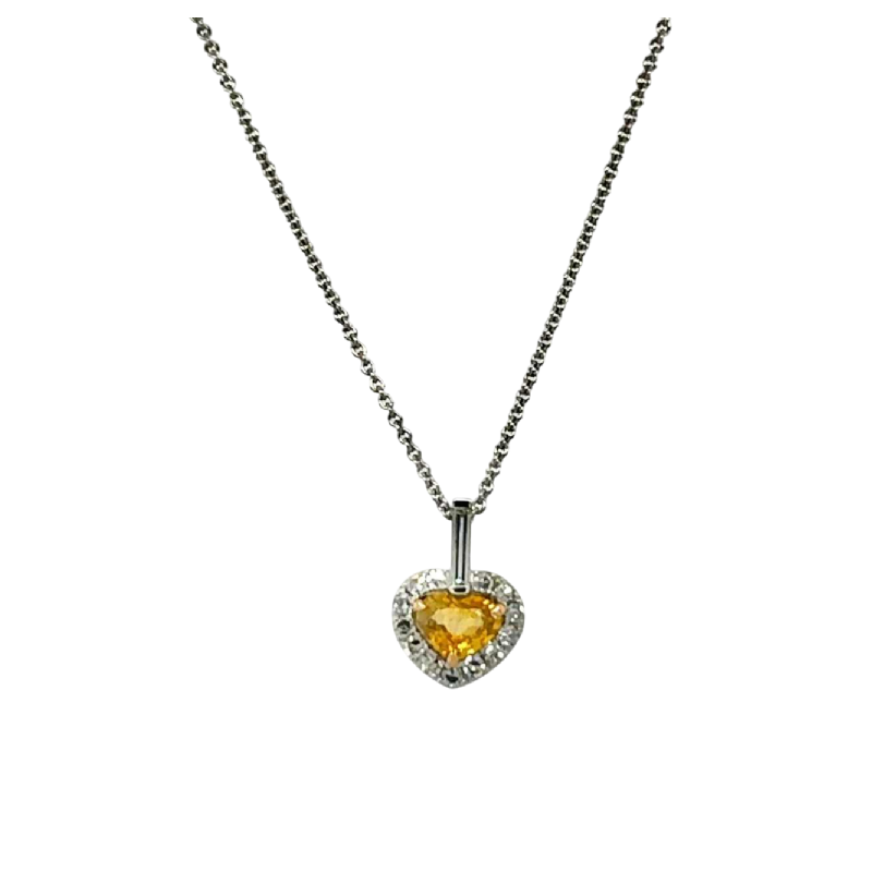 Pendentif 'Cur' en or blanc, saphir jaune, diamants et diamants 'baguette'