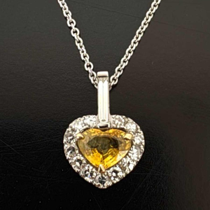 Hart' hanger in witgoud, gele saffier, diamanten en 'baguette' diamanten