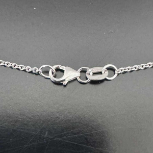 Pendentif 'Cur' en or blanc, saphir jaune, diamants et diamants 'baguette'