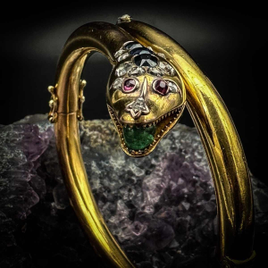Belle époque snake bangle bracelet in gold, diamond, sapphires, emeralds, late 19th century