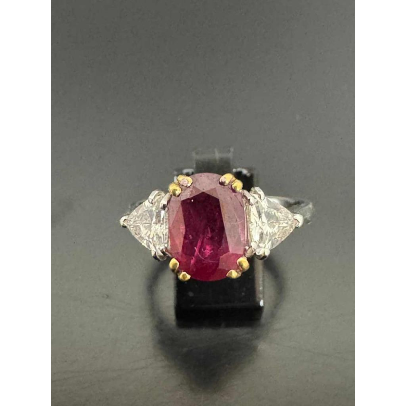 Bague en or bicolore (jaune et blanc) diamants & rubis central