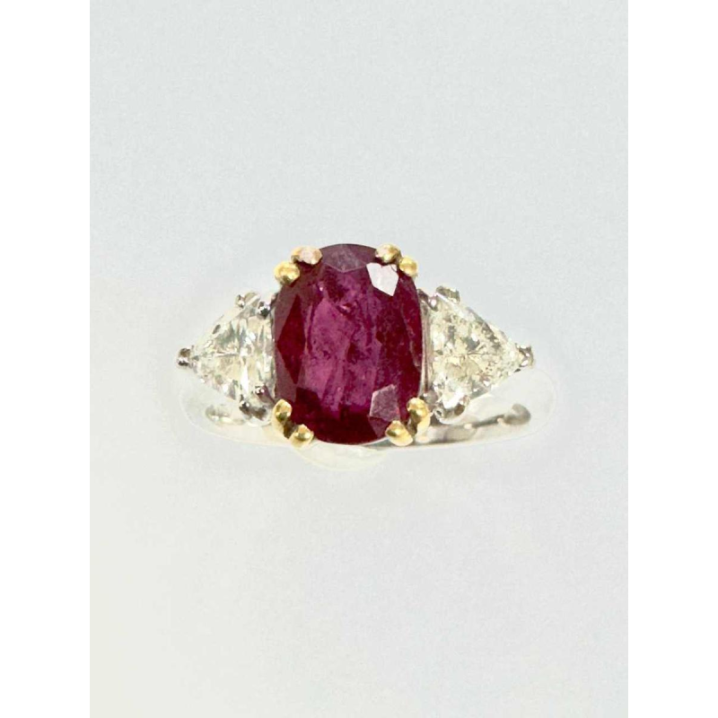 Two-tone gold ring (yellow and white) with diamonds and central ruby