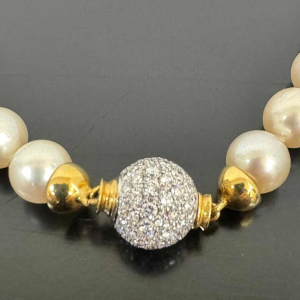 Parelketting in tweekleurig goud & diamant