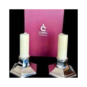 Cunill Orfebres, pair of solid silver candlesticks, 20th century