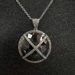 Gold, diamond & black diamond pendant