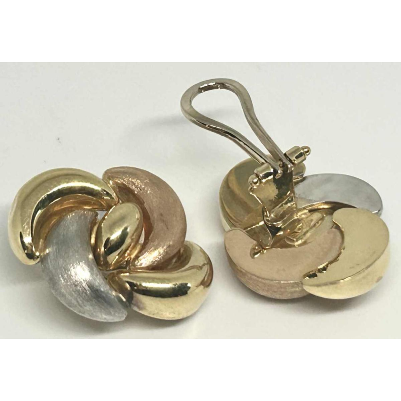 Pair of clip earrings in tricoloured gold