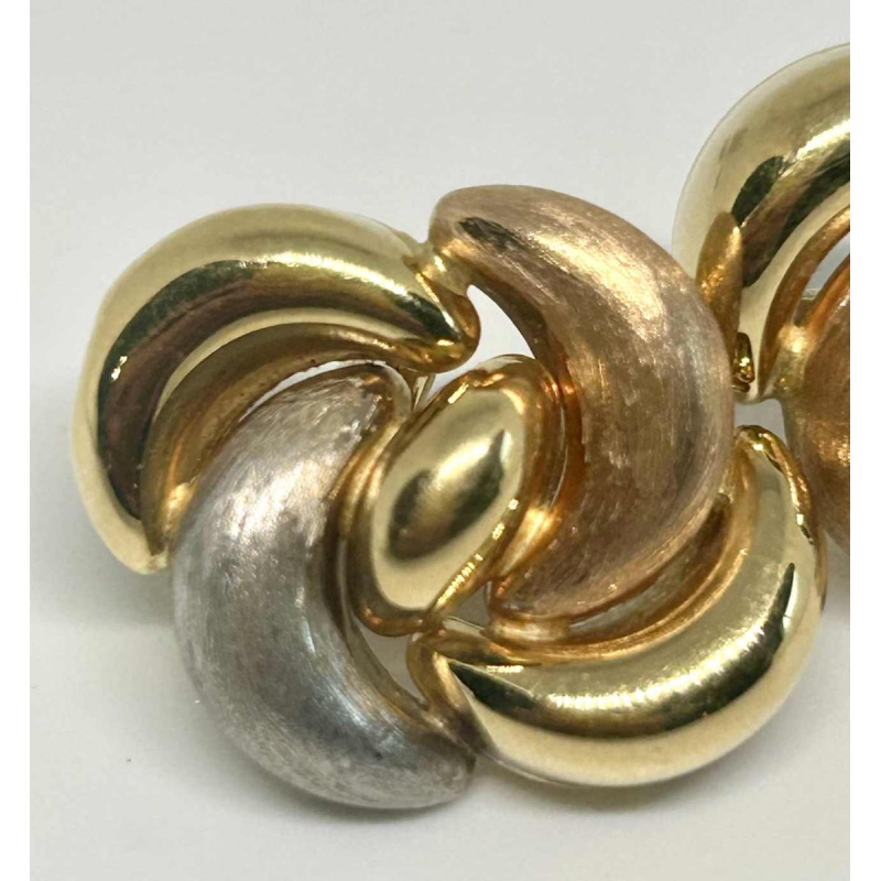 Pair of clip earrings in tricoloured gold