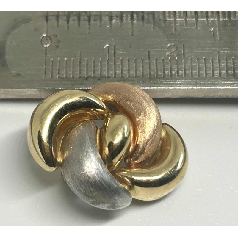 Pair of clip earrings in tricoloured gold