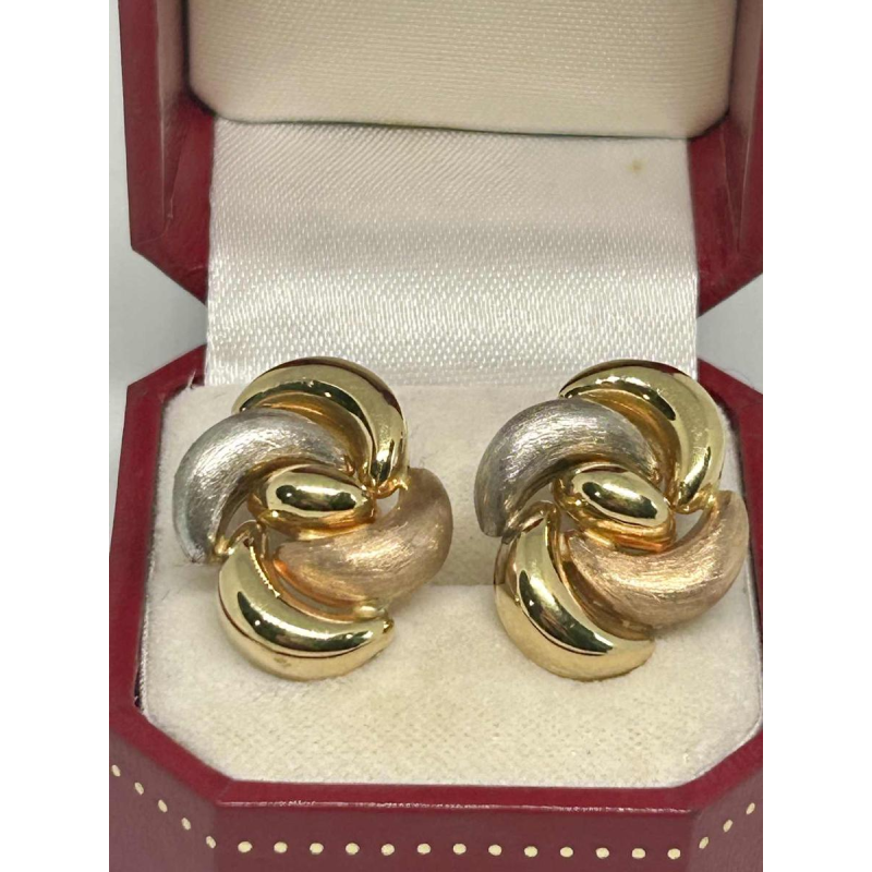 Pair of clip earrings in tricoloured gold