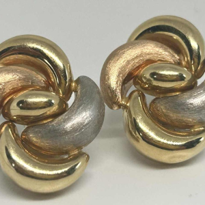 Pair of clip earrings in tricoloured gold