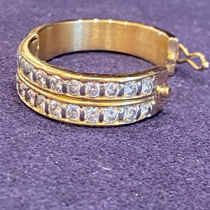 Bague Ã  systÃ¨me d'ouverture or & diamants, ca 1990