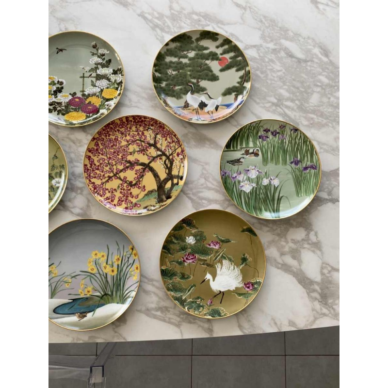 Naoka Nobata for Franklin Mint, 12 porcelain plates, birds and flowers from the Far East