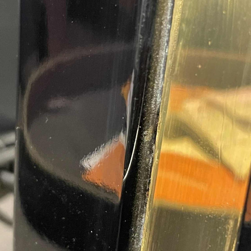 Pair of Hollywood Regency lamps, black lacquer and brass, circa 1970