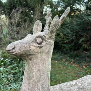Garden sculpture in patinated cement representing a deer, mid-20th century
