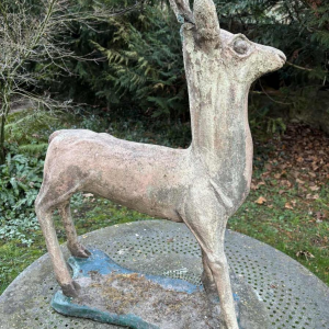 Garden sculpture in patinated cement representing a deer, mid-20th century