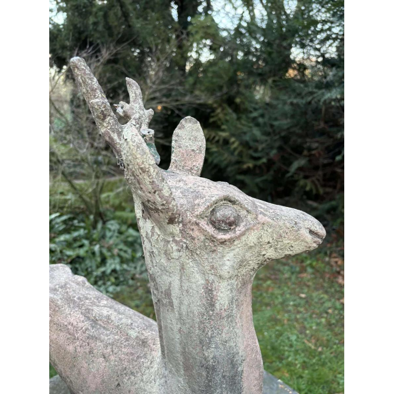 Garden sculpture in patinated cement representing a deer, mid-20th century