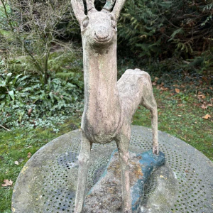 Garden sculpture in patinated cement representing a deer, mid-20th century