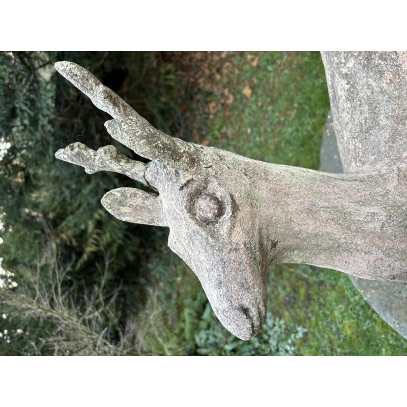 Garden sculpture in patinated cement representing a deer, mid-20th century