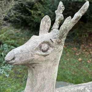 Garden sculpture in patinated cement representing a deer, mid-20th century
