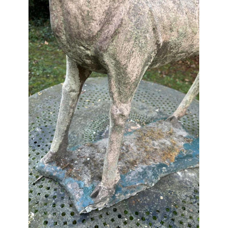 Garden sculpture in patinated cement representing a deer, mid-20th century