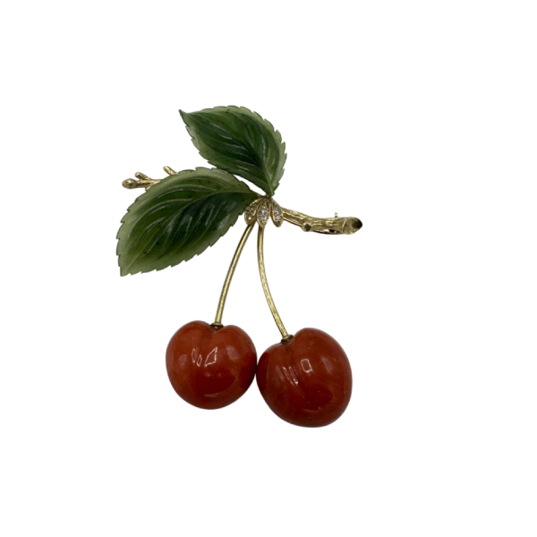 Ernst Paltscho brooch in 14-carat yellow gold, coral and jadeite. Circa 1980