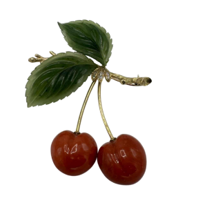 Ernst Paltscho brooch in 14-carat yellow gold, coral and jadeite. Circa 1980