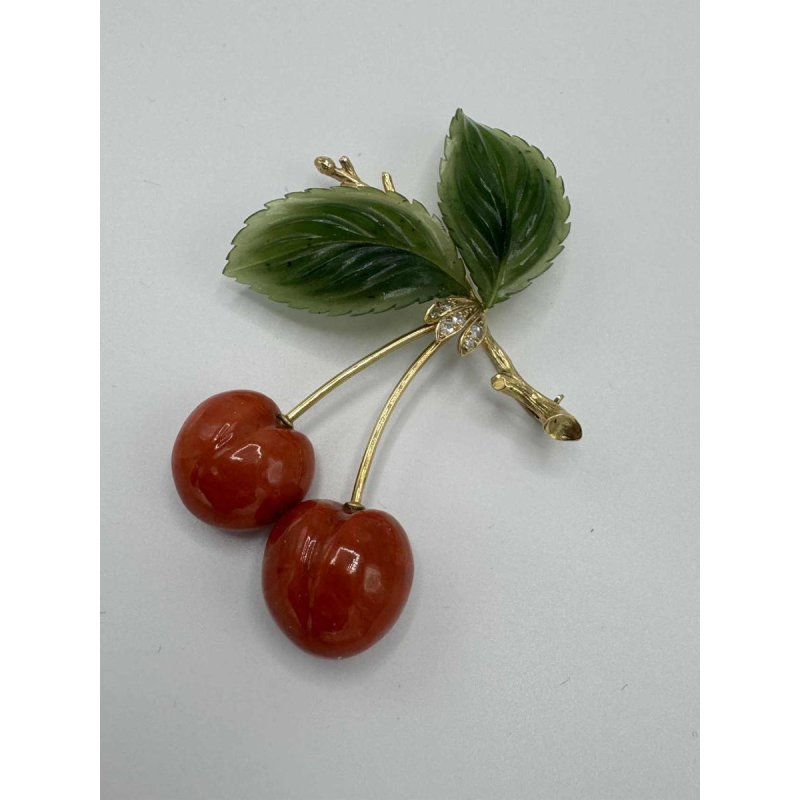 Ernst Paltscho brooch in 14-carat yellow gold, coral and jadeite. Circa 1980