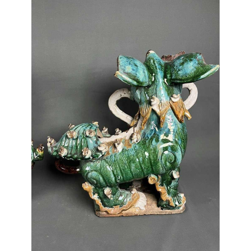 Pair of Fô dogs with prunus ribbons, Shiwan glazed stoneware, Southern China