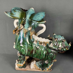 Pair of Fô dogs with prunus ribbons, Shiwan glazed stoneware, Southern China