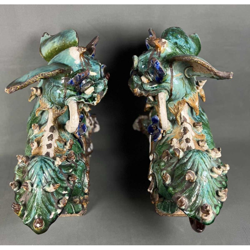 Pair of Fô dogs with prunus ribbons, Shiwan glazed stoneware, Southern China