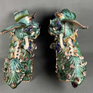 Pair of Fô dogs with prunus ribbons, Shiwan glazed stoneware, Southern China