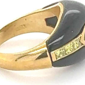 Yellow gold, onyx, diamonds & sapphire ring