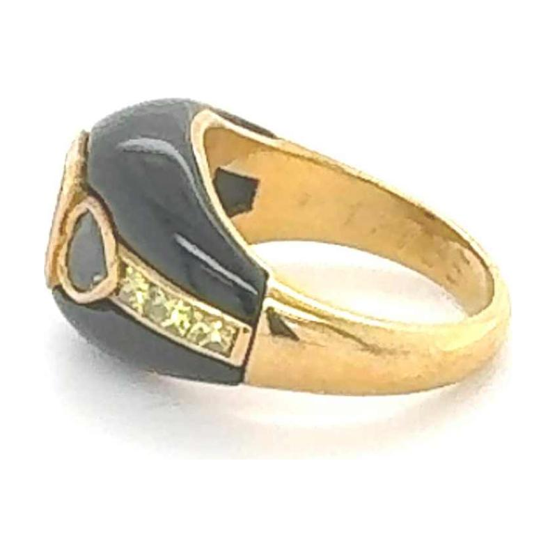 Yellow gold, onyx, diamonds & sapphire ring