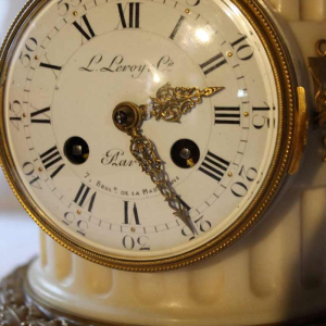 White marble clock by L. Leroy, gilt bronze Amour Cupidon sculpture by Carlier, 19th c