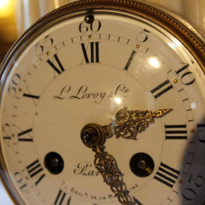 White marble clock by L. Leroy, gilt bronze Amour Cupidon sculpture by Carlier, 19th c